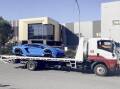 A Lamborghini has been seized by police as part of a raid on an alleged steroid trafficker. (HANDOUT/VICTORIA POLICE)