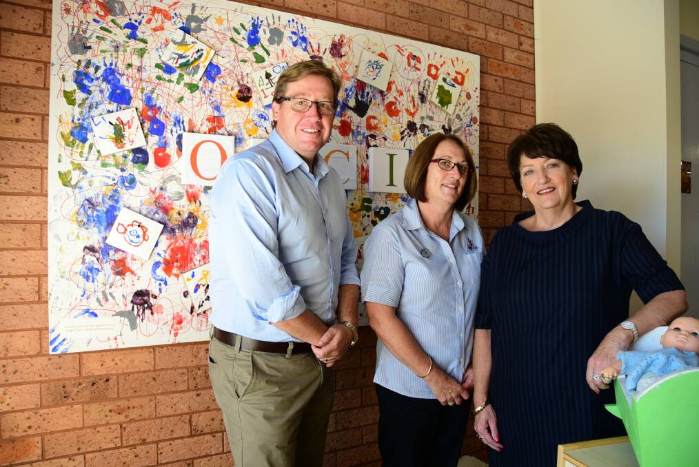 Dubbo MP Troy Grant with Janelle Burke and Nola Honeysett at Orana Early Childhood Intervention Centre, which is the recipient of $157,807 in funding through the NSW government's Intervention Support Program. Photo: BELINDA SOOLE