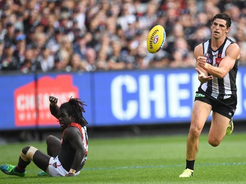 Scott Pendlebury and the Collingwood midfield have dominated their Anzac Day AFL win over Essendon.