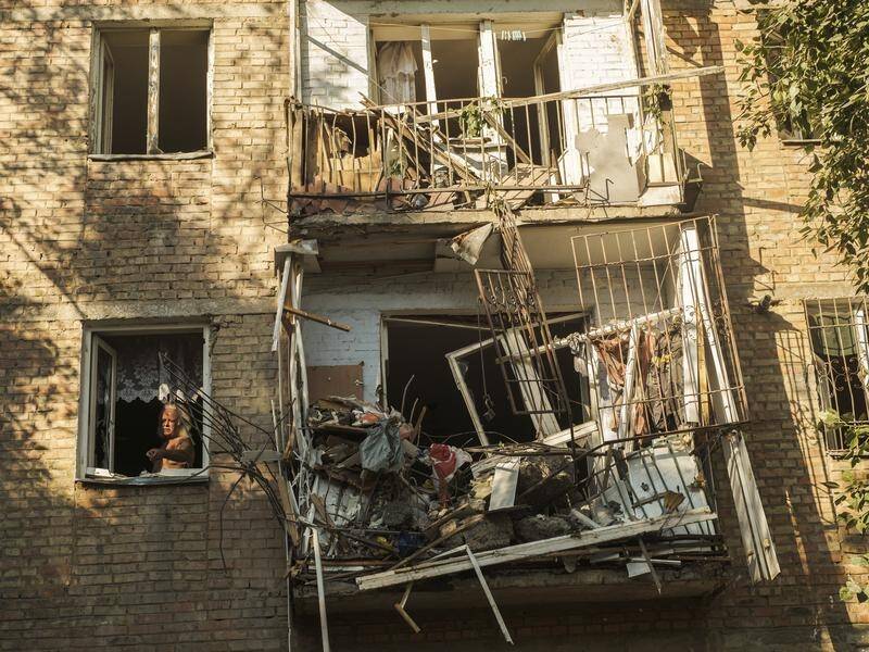 Eight missiles struck Mykolaiv, its mayor said, killing four people and wounding five.