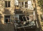 Eight missiles struck Mykolaiv, its mayor said, killing four people and wounding five.