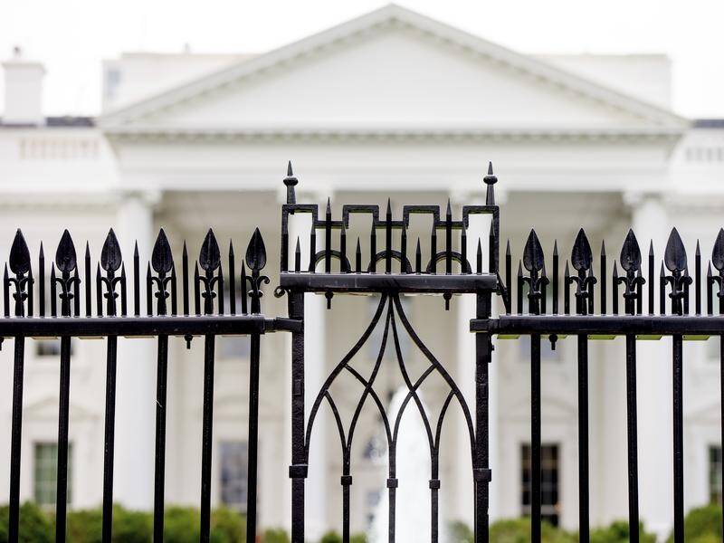 A driver died after crashing a vehicle into a gate at the White House. (AP PHOTO)