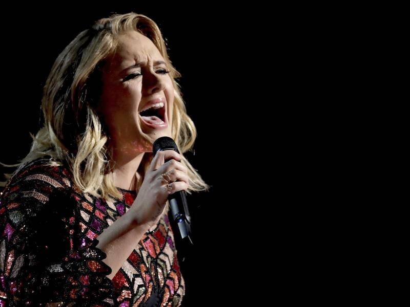 Adele has postponed a three-month Las Vegas residency due to her crew getting sick with COVID-19.