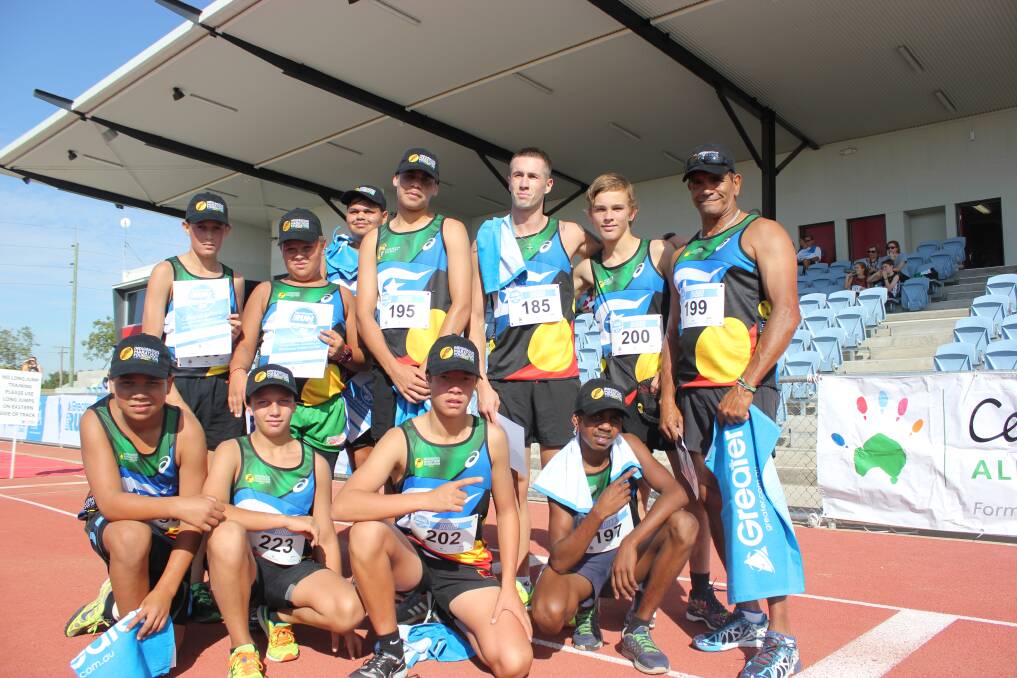 Nathan Riley, back row third from right, with his team of Indigenous runners after completing the Fun Run on Sunday. 	        Photo: JENNIFER HOAR