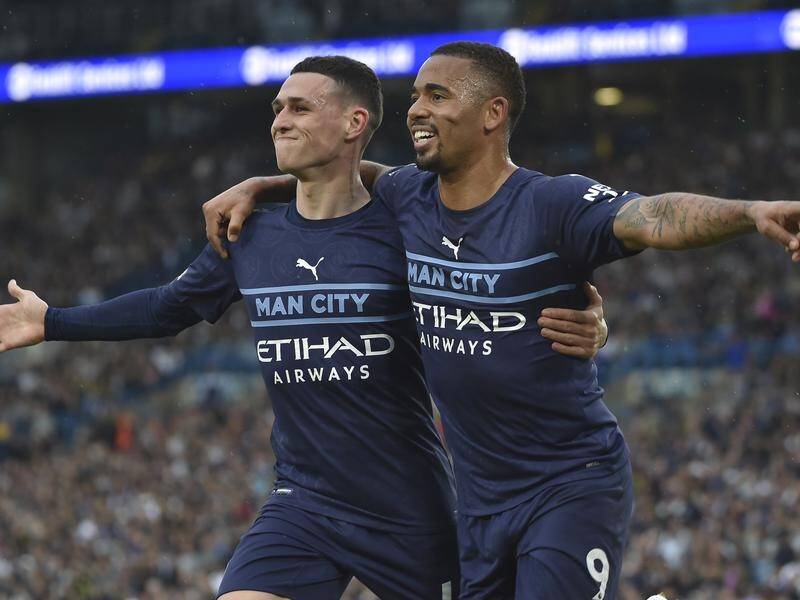 Man City's Gabriel Jesus (R) celebrates his goal with Phil Foden in their crucial win over Leeds.