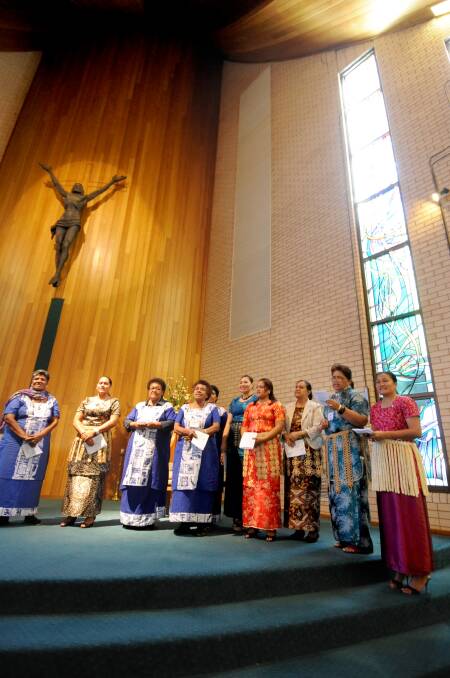 Associated Women of the World members from Fiji, Tonga and Papua New Guinea singing hymns in traditional dress. Photo LOUISE DONGES