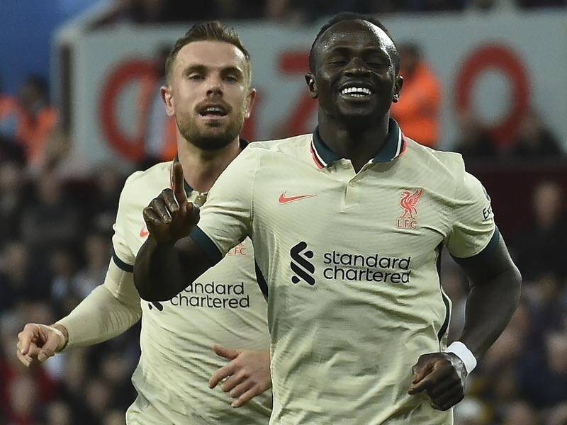 Sadio Mane headed home Liverpool's winner at Aston Villa to keep their EPL title hopes alive.