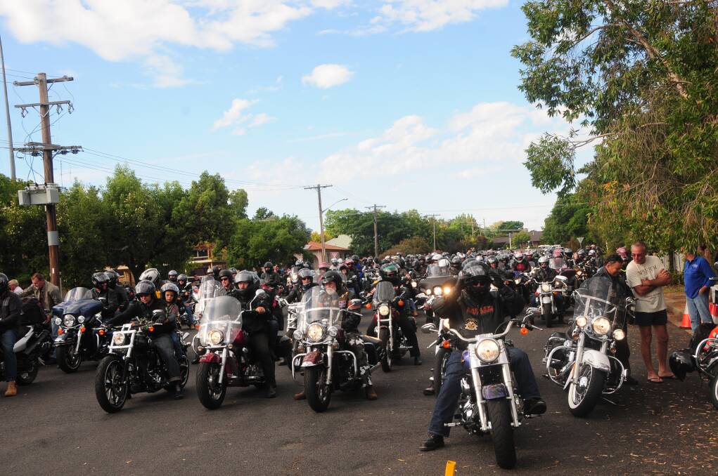 The 268 riders line up to start the Black Dog Ride near Short Street.	    Photo: LAURA McINTYRE