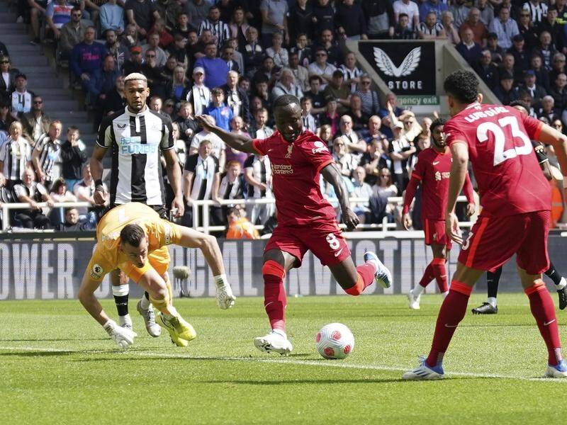 Liverpool's No.8 Naby Keita scoring their crucial winner against Newcastle at St James' Park.