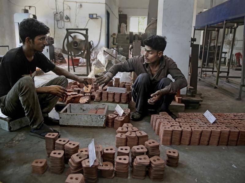 India's economy grew at five per cent in April-June quarter, its slowest annual pace in six years.