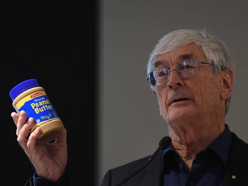 Businessman Dick Smith has blamed the rapid rise of Aldi for the closure of his namesake food brand.