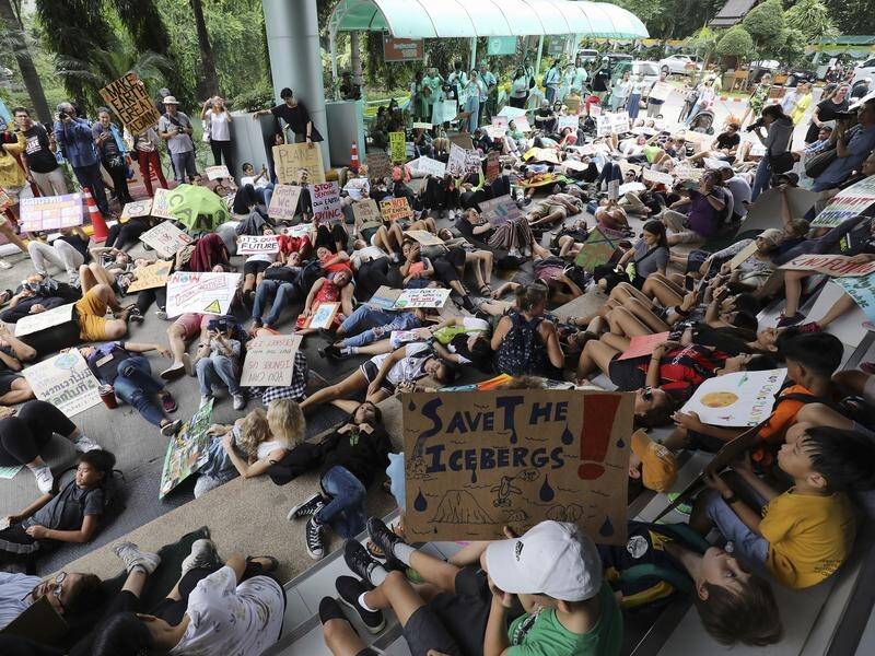 Protestors staged a "die-in" in front of Thailand's Environment Ministry in Bangkok.