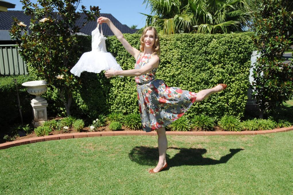 Lisa Edwards with the tutu she first wore when starting eisteddfods in Dubbo. 					  Photo: HANNAH SOOLE