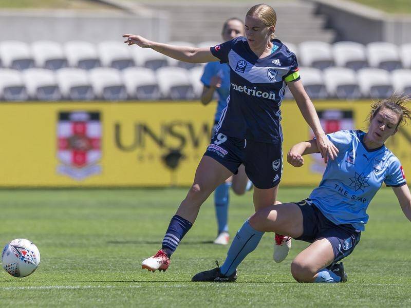 Natasha Dowie (l) was a three-goal hero for the Victory who enjoyed a rare win over Sydney FC.