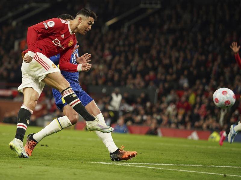 Cristiano Ronaldo scores Manchester United's equaliser against Chelsea at Old Trafford.