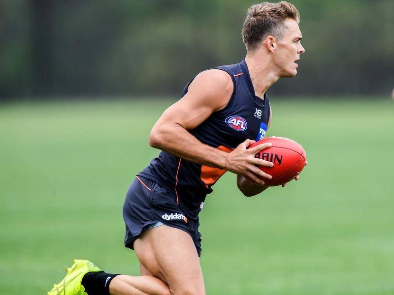 Even at training AFL Giants player Zac Langdon is full of running and has a strong work ethic.