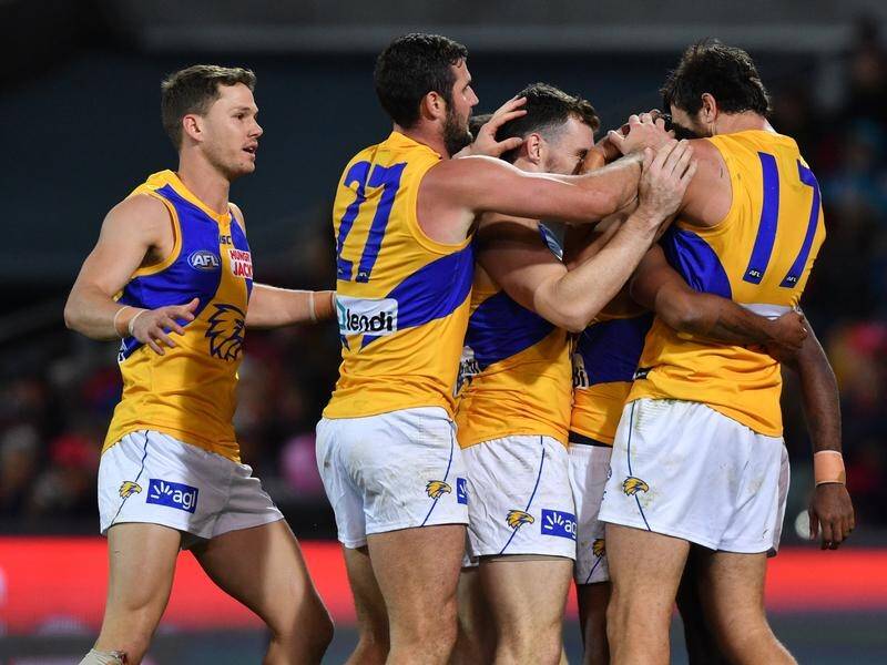 West Coast have overcome a 33-point deficit for a stunning AFL away win over the Crows in Adelaide.