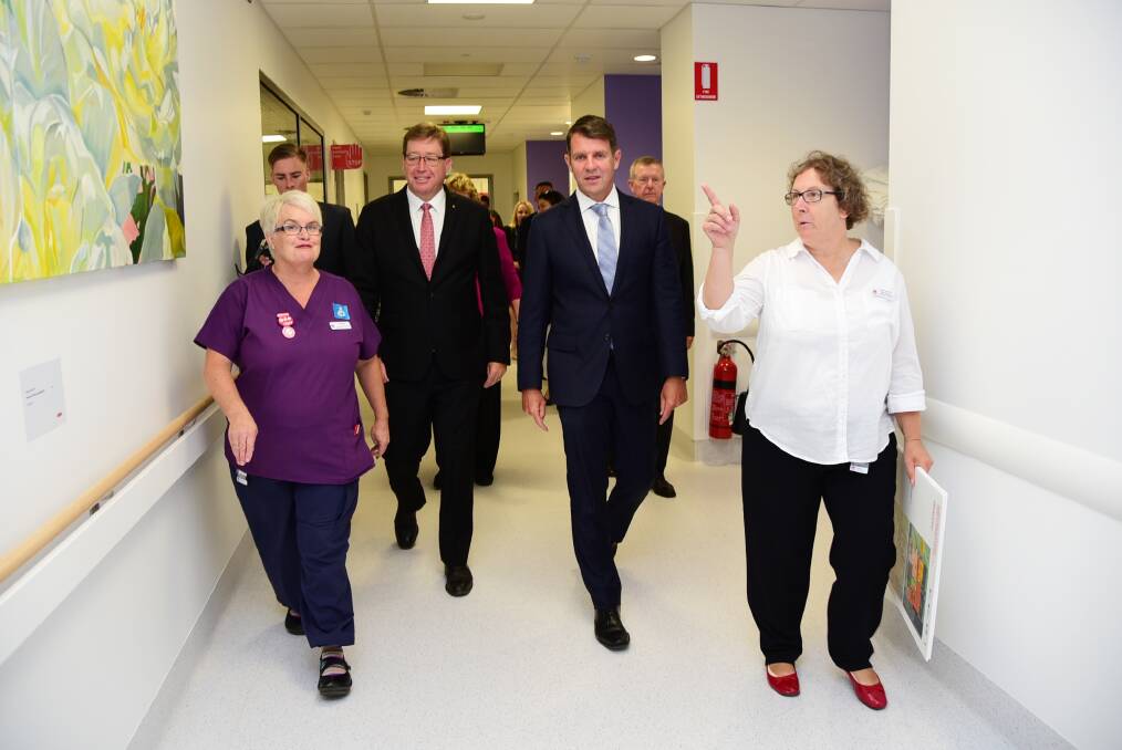 Dubbo Hospital general manager Debbie Bickerton (right) and midwifery unit manager Jayne Lawrence (left) escort NSW Deputy Premier and state Member for Dubbo Troy Grant and NSW Premier Mike Baird through the hospital s new maternity unit. 	Photo: BELINDA SOOLE