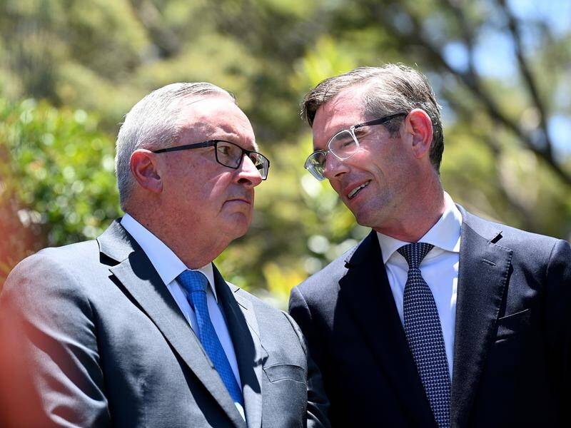 Brad Hazzard (left) remains as NSW's health minister under Premier Dominic Perrottet's shake-up.