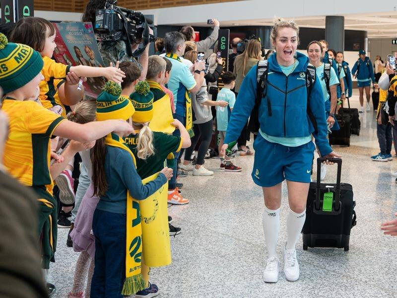 The Matildas have touched down in Sydney ahead of their Women's World Cup semi-final with England. (Flavio Brancaleone/AAP PHOTOS)