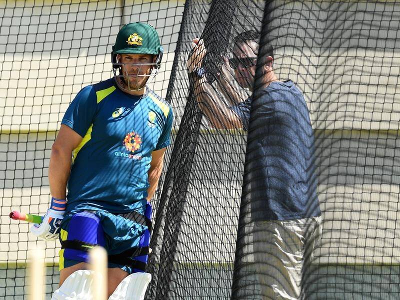Former skipper Ricky Ponting (right) was an interested spectator during Aaron Finch's net session.