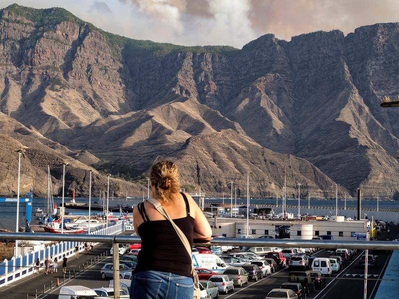 A forest fire on Spain's Gran Canaria island has forced the evacuation of 40 towns and villages.