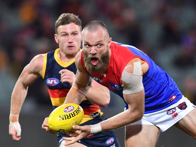 Melbourne will be without captain Max Gawn for their crunch AFL match against Collingwood.
