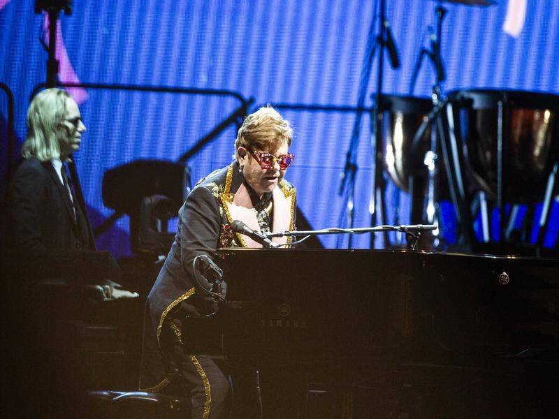 Elton John's show in Victoria was interrupted by wild weather that forced the performer offstage.