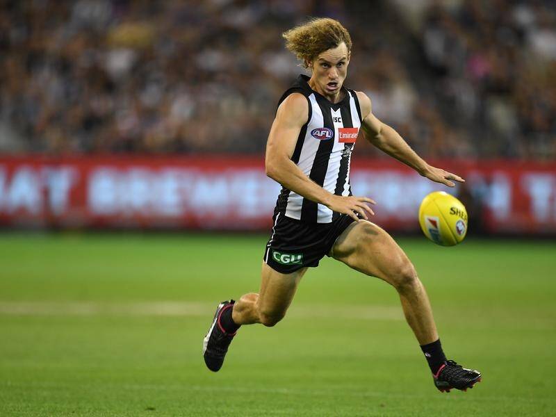 Chris Mayne returns for Collingwood after a long absence when the Pies face Richmond on Sunday.