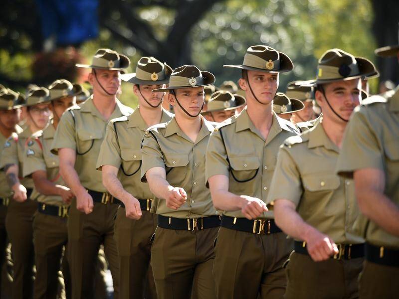 Some 16,000 serving and ex-ADF personnel marched along Sydney's Elizabeth Street.
