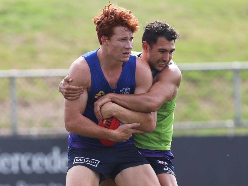 Alex Keath (l) should be ready for the AFL pre-season after healing from surgery, say the Bulldogs.