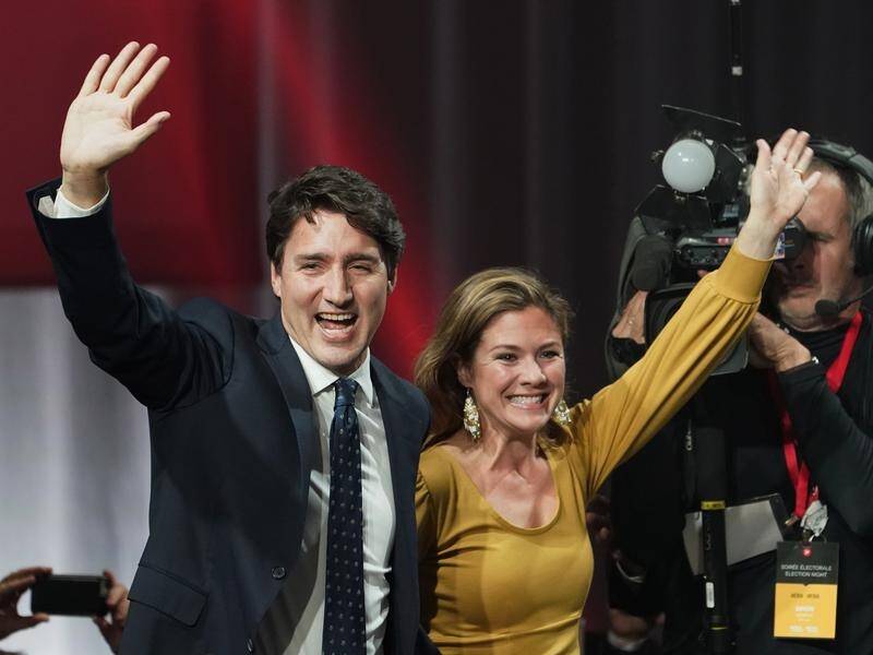 Canadian Prime Minister Justin Trudeau declared victory with his wife, Sophie Gregoire Trudeau.