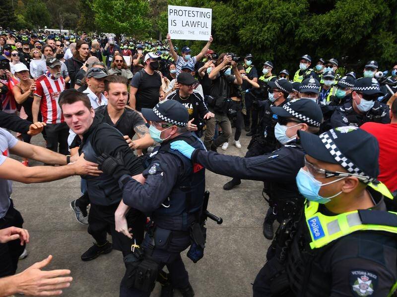 Police have scuffled with anti-lockdown protesters at Melbourne's Shrine of Remembrance.