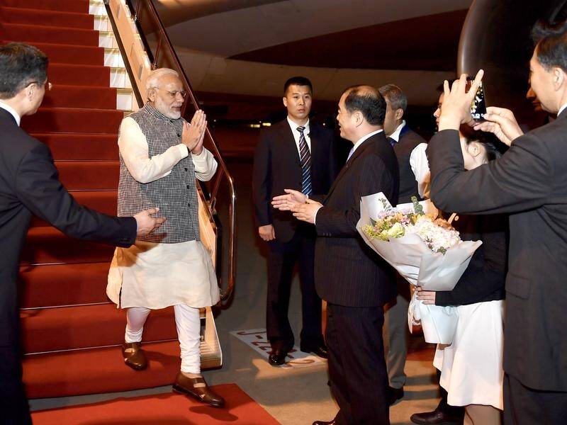 India's Prime Minister Narendra Modi arrives in China for two-day talks with President Xi Jinping.