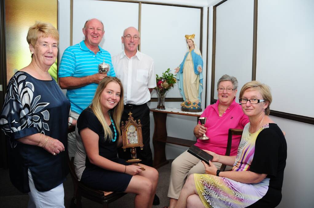 Helen Hughes, Geoff Mann, Father Greg Kennedy, Mickaela Wright, Carole O Connor and Genevieve Menzies are involved in organising activities to celebrate the 150th anniversary of St Brigid's Catholic Parish. 						  Photo: BELINDA SOOLE