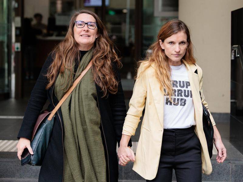 Kristen Morrissey (left) is accused of harming Woodside employees with stench gas. (Richard Wainwright/AAP PHOTOS)