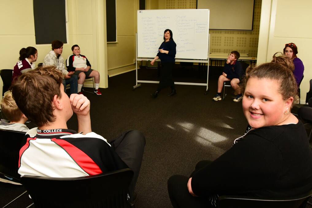 Cassie Shadwell listens in to instructions at Headspace's Class Clowns on Thursday.  
				    Photo: Belinda Soole