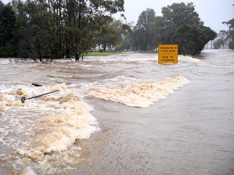 With dams full, grounds saturated and snow melting, flooding around NSW could continue for months. (Jeremy Piper/AAP PHOTOS)
