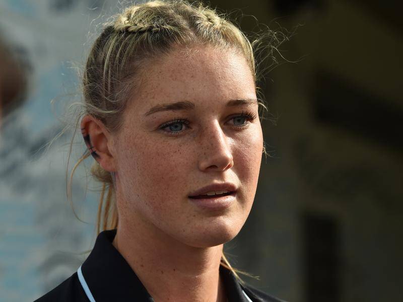 Tayla Harris addressed the media about online misogynistic comments made about her.
