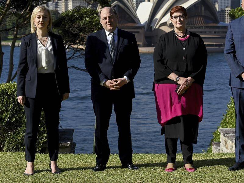 The British and Australian ministers discussed how the nations can counter authoritarian states.