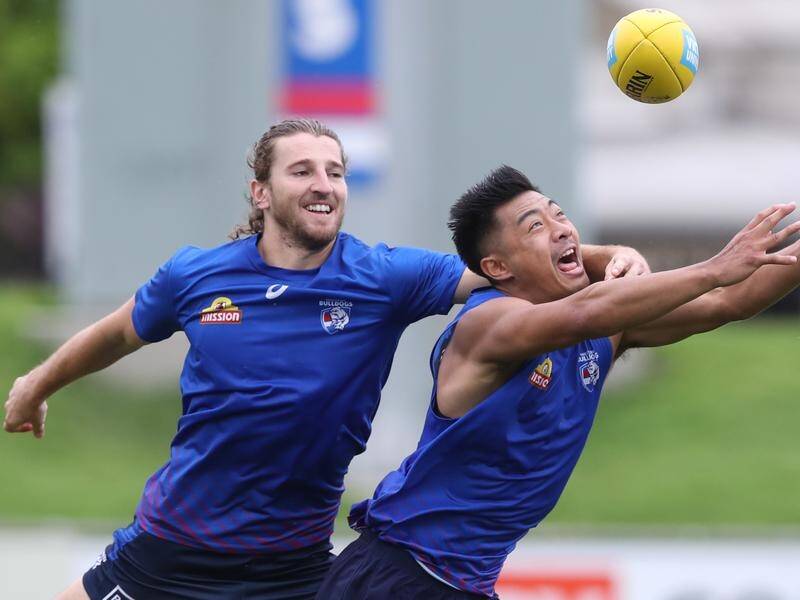 Western Bulldogs duo Marcus Bontempelli and Lin Jong training at Whitten Oval.