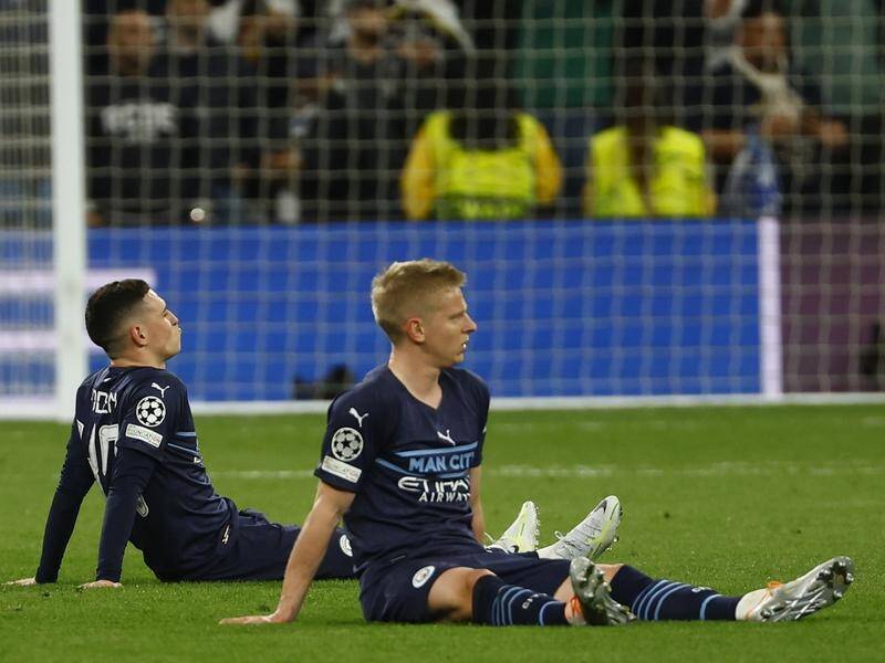 Man City's players were dejected at the Bernabeu but manager Pep Guardiola says they'll rise again.