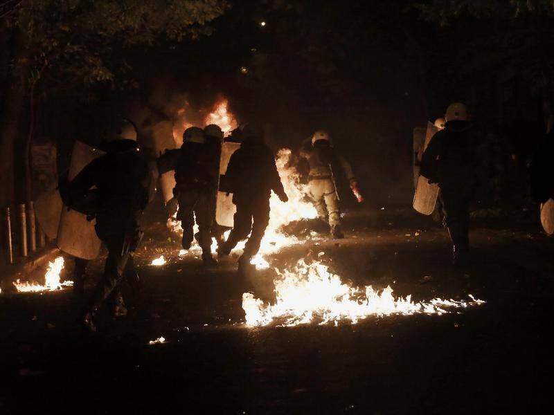 Three people have been injured when a protest rally turned violent in Athens.