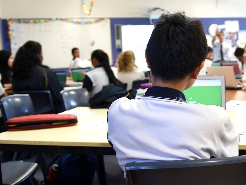 A new inquiry is beginning into a worsening teacher shortage in NSW, with 3300 vacancies at schools. (Paul Miller/AAP PHOTOS)