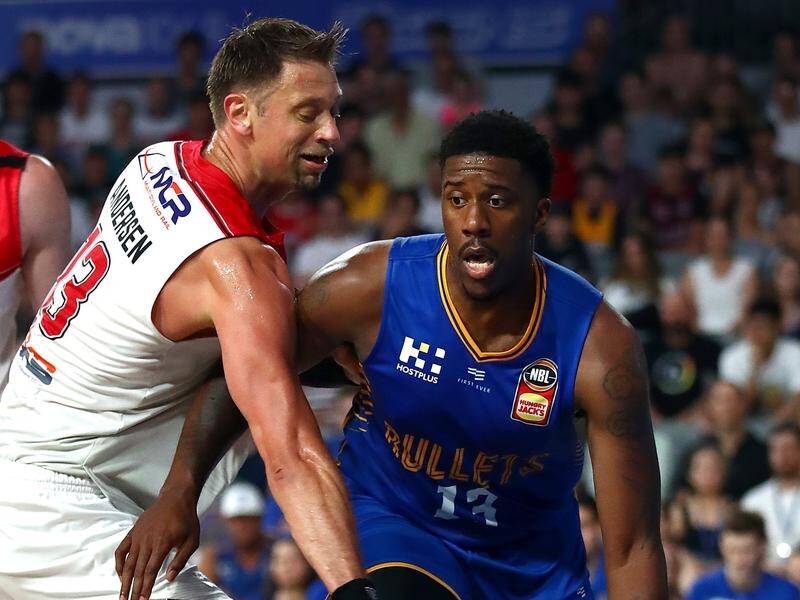 Lamar Patterson (r) has guided the Bullets to a 10-point win over Illawarra in Brisbane.