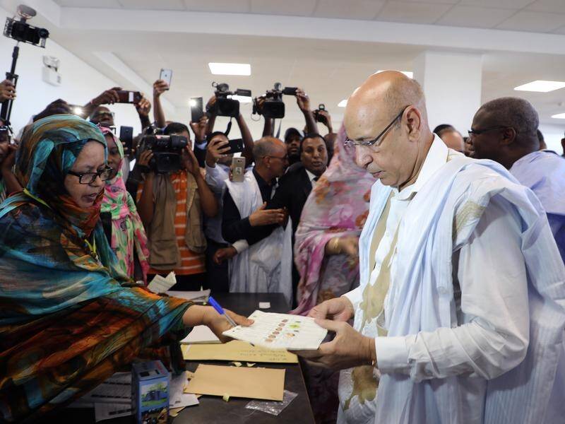 Mohamed Ould Ghazouani (pictured voting) has won the Mauritanian presidential election.