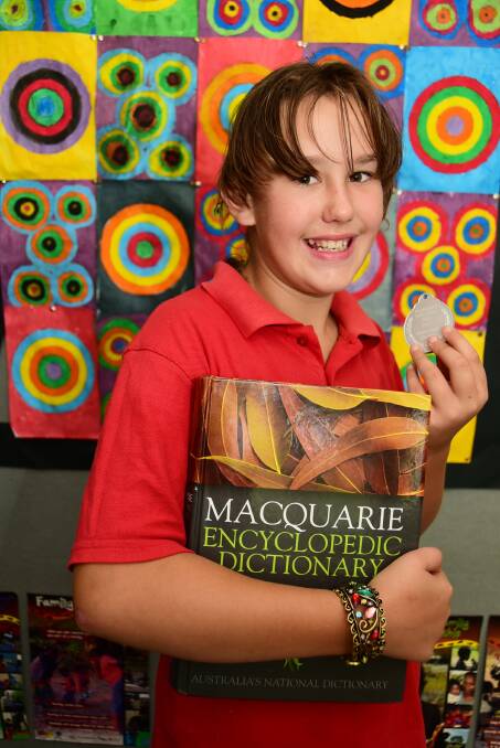 Holly Adams shows off her prizes after returning from the Premier s Spelling Bee competition.	 										      
Photo: BELINDA SOOLE