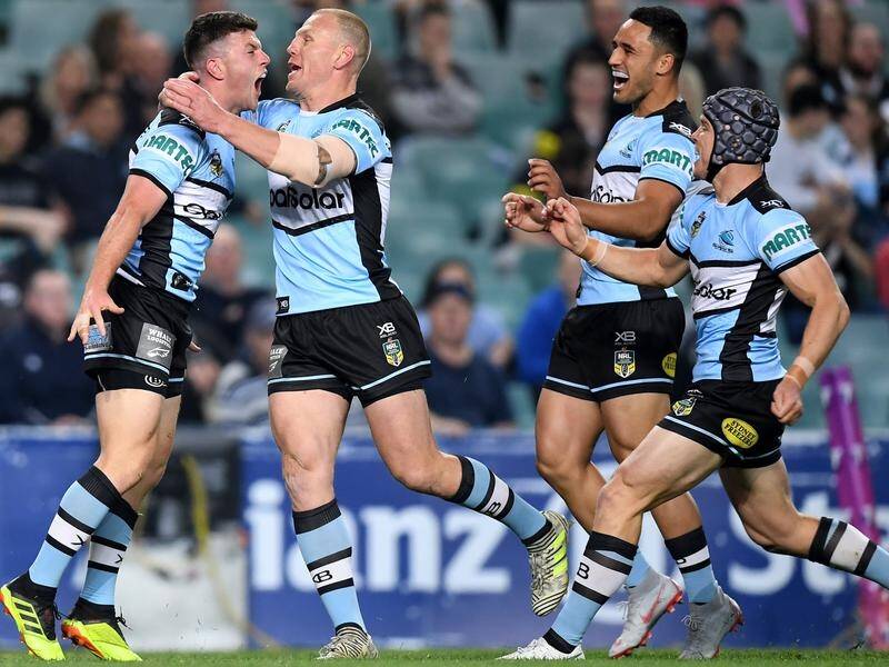 Cronulla are through to a NRL preliminary final with premiers Melbourne after edging Penrith.