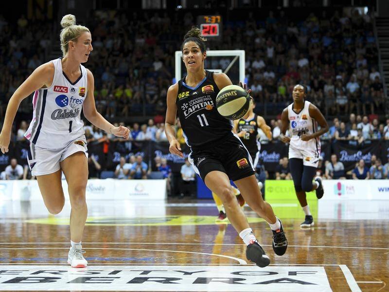 Kia Nurse, right, inspired Canberra Capitals to victory over Melbourne Boomers.