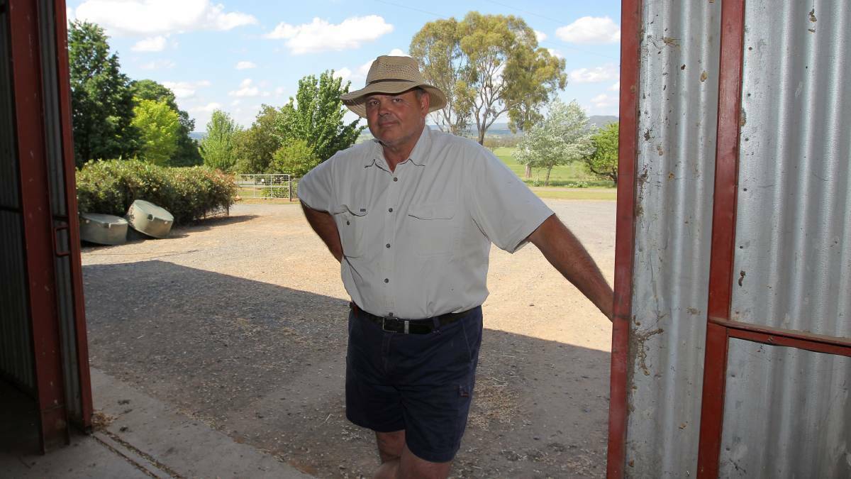 RELEIVED: Paul Rogers in a shed where his white Toyota Landcruiser was stolen. He says he has no ill feeling towards Gino and Mark Stocco. Photo: BLAIR THOMSON